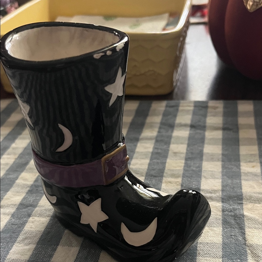 Black Ceramic Boot with Stars and Moons needs a paint touch up see pictures